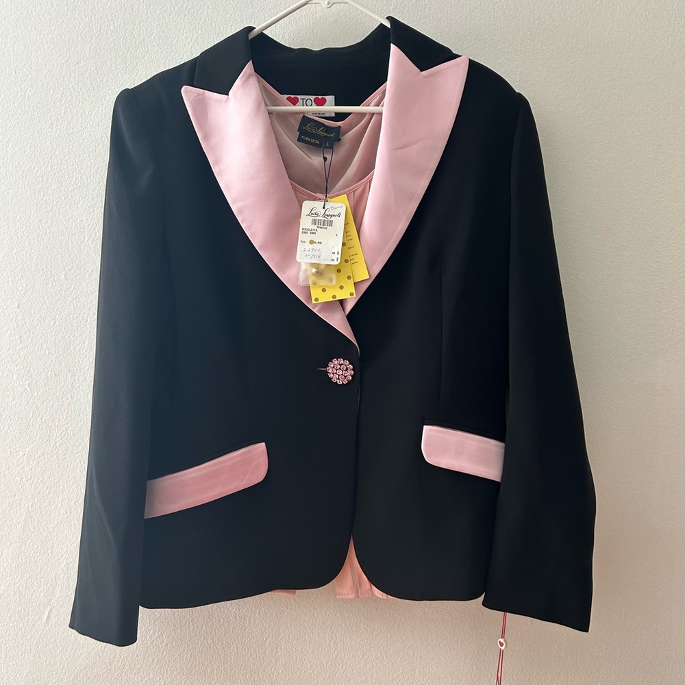 Elegant Italian black blazer with pink satin accents.